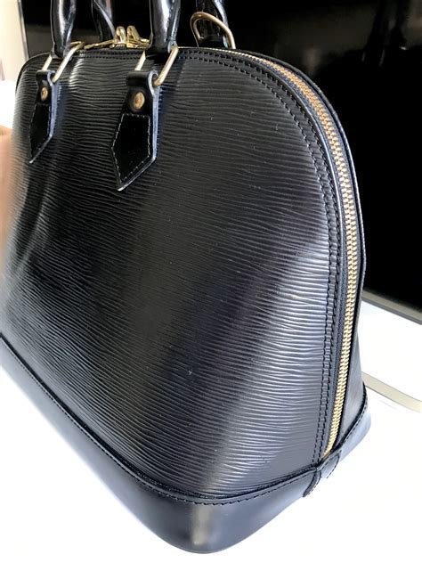 louis vuitton epi riviera bag|louis vuitton black alma bag.